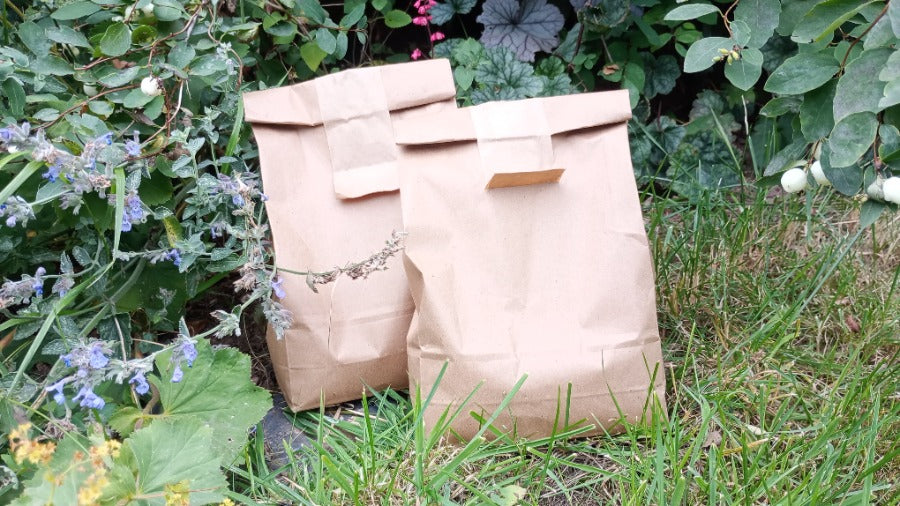 paper bags full of organic fertiliser, mixed and sold by Organic Plant Nursery
