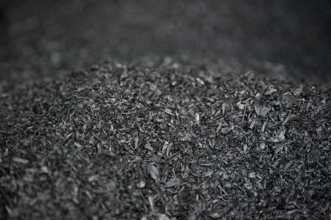 Photo of a pile of biochar carbon